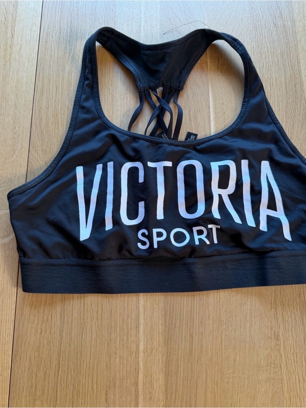 Victoria's Secret Black Sports Bra with White Logo and Strappy Back